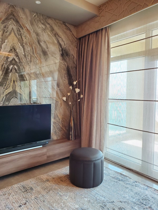 luxurious interior decor palm jumeirah, dubai interior designer, marble feature., custom furniture, gypsum ceiling, led lighting, book shelves with rose gold