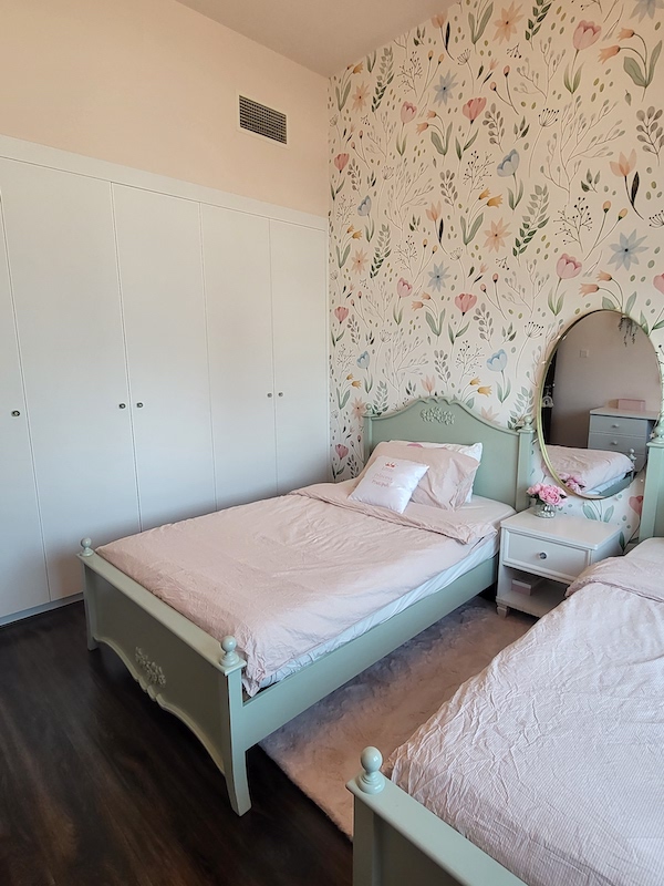 crystal chandelier, 2 girls bedroom, girly room with flowers makeover in dubai, dubai kids interiors, girls room styling in dubai