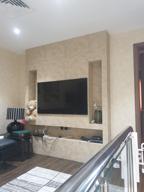 home styling in dubai, tv wall design, interior designer dubai, staircase landing area styling, modern play area, dubai home interiors., dubai styling