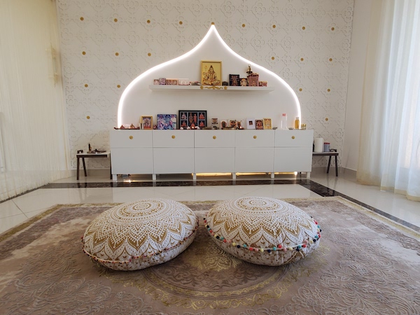 home temple dubai, home interiors., mashribya, gold modern wallpaper mandala, floor seating, hindu dubai