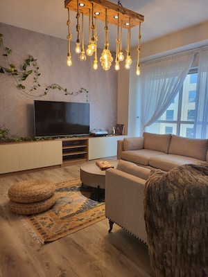 brick wall contemporary living room jbr, home renovations styling, interior designer in dubai, dubai home improvements renovations